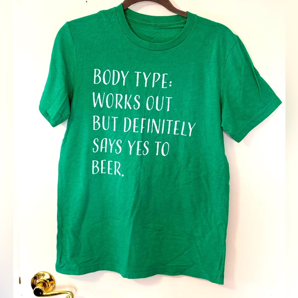 fun graphic tee!! gently worn but in great condition